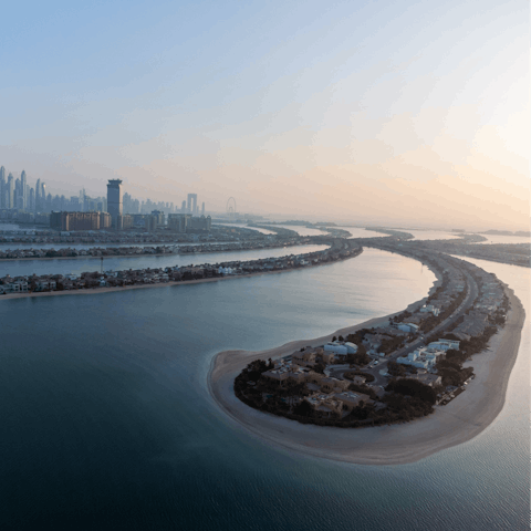 Stroll along the sands of your private beach – it's steps away