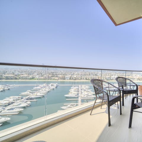 Sip your morning coffee from your panoramic-viewed balcony