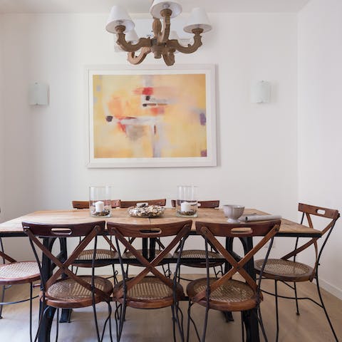 Come together for meals around the rustic dining table