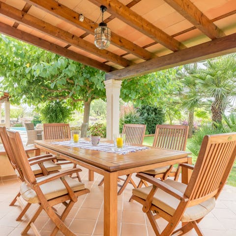 Gather on the covered terrace to tuck into meals alfresco