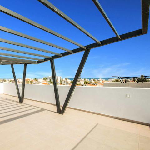 Take in the sea views from the rooftop terrace