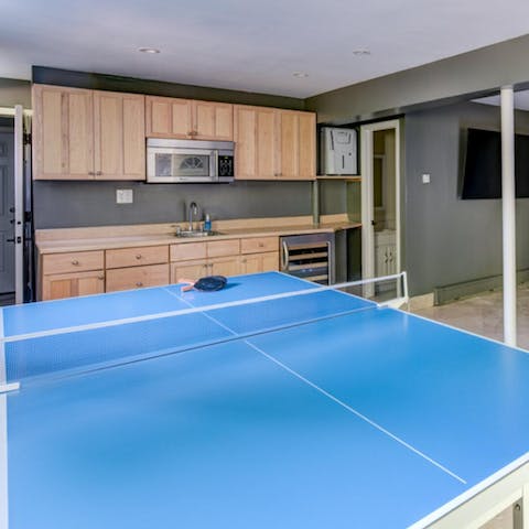 Play a few rounds of ping pong in the games room