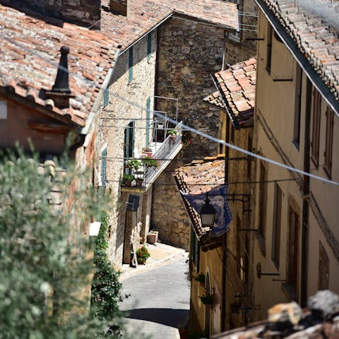 Mosey around the sleepy village of Sarteano on a warm afternoon