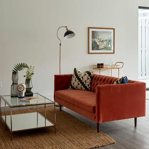 Lounge on the plush sofa and rest weary legs after a long day exploring New Orleans