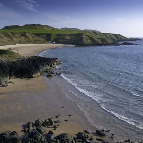 Drive sixteen minutes to discover the beautiful  Porth Neigwl