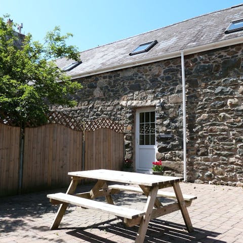 Enjoy breakfast alfresco before setting off to explore Pwllheli