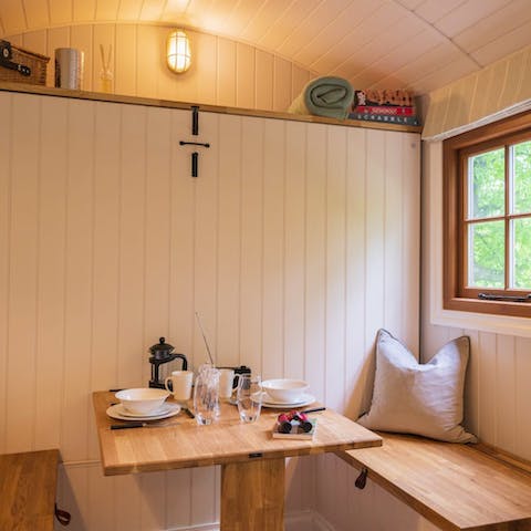 Wake up to leafy views and enjoy the simple charm of this home