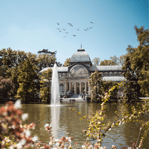 Take in the greenery and lakeside views with a visit to Retiro Park