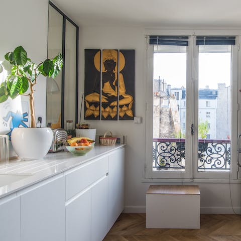 Sip your morning coffee while people-watching from the kitchen's Juliet balcony