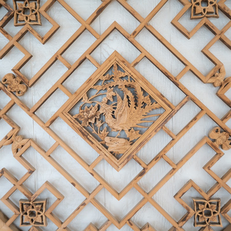 Marvel at stunning, hand-carved teak around the home