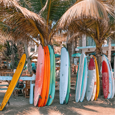Try your hand at surfing, you can take a surf lesson on Surin Beach