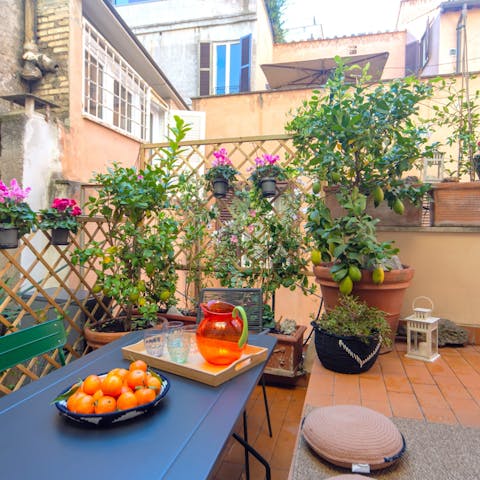 Raise a toast to your Roman holiday on the pretty terrace