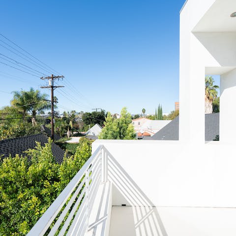Catch some rays on one of the home's two balconies