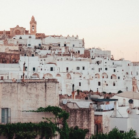 Meander through the whitewashed old town of Ostuni