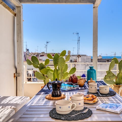 Dine alfresco for lunch and dinner, overlooking the Mediterranean Sea