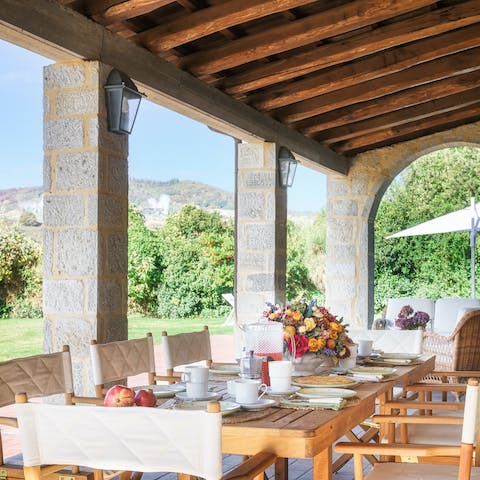 Sit down for an alfresco breakfast on your covered terrace