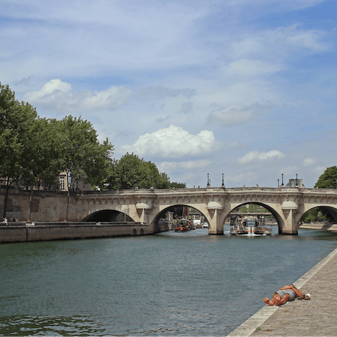 Take a stroll along the banks of the Seine, a twenty-five-minute walk away
