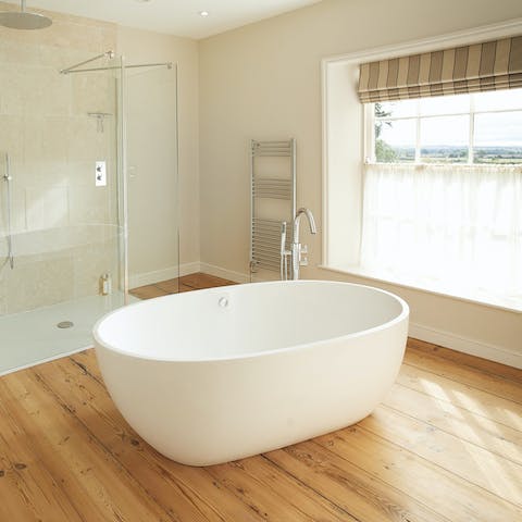 Soak in the freestanding tub at the end of a busy day outdoors