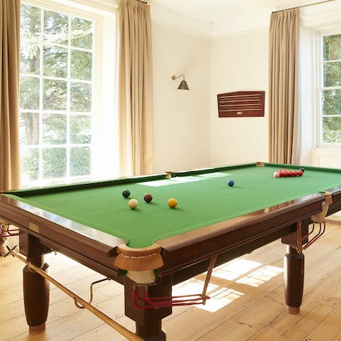 Enjoy a game of snooker with loved ones for a fun-filled few hours
