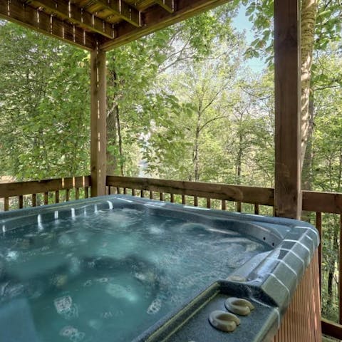 Bubble away in the hot tub, surrounded by wildlife and nature