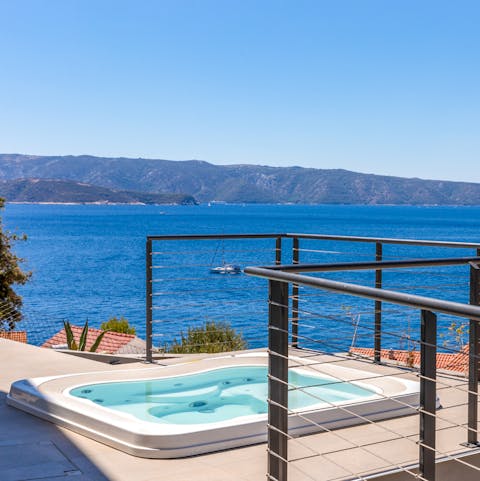 Enjoy mesmerising views whilst soaking in the jacuzzi