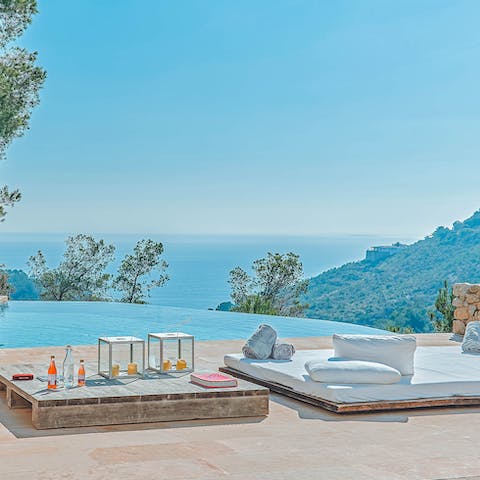 Drink in the glorious sea views from the heated pool