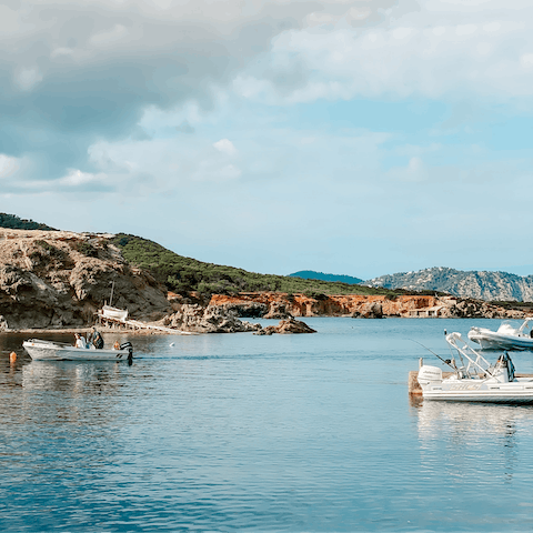 Splash in the shallows of Cala Olivera – it's a five-minute walk