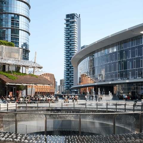 Walk down to Piazza Gae Aulenti for shopping and restaurants