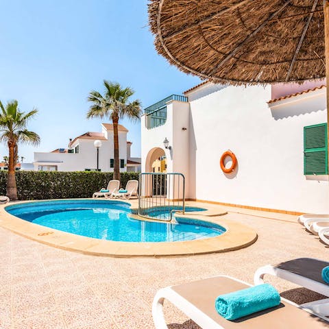 Leave the shade of the patio umbrella and slip into the cool water