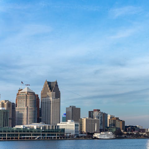 Watch the sun set over the Detroit River, just a twenty-minute stroll from your front door