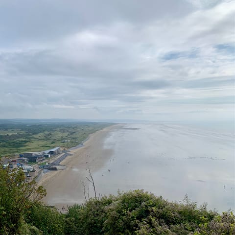 Enjoy a refreshing walk along the 7 mile stretch of Pendine Sands
