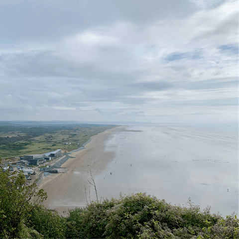 Enjoy a refreshing walk along the 7 mile stretch of Pendine Sands