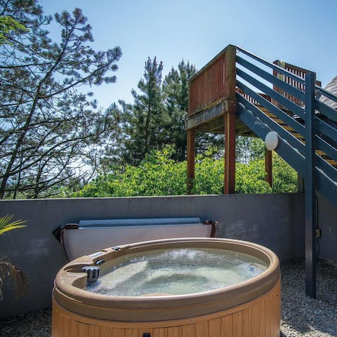 Relax in the hot tub after an exhilarating day on the coast