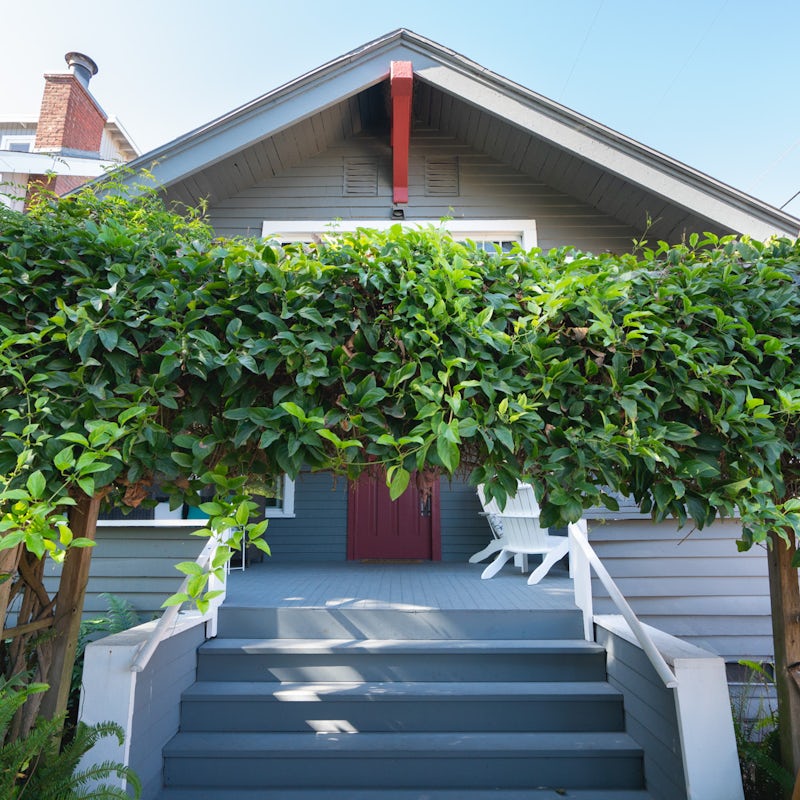 Arrive in style at the lush entrance to your bungalow