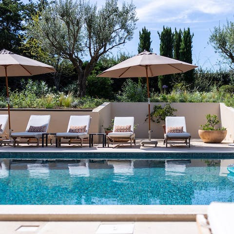 Spend the day by the pool or walk to the seafront