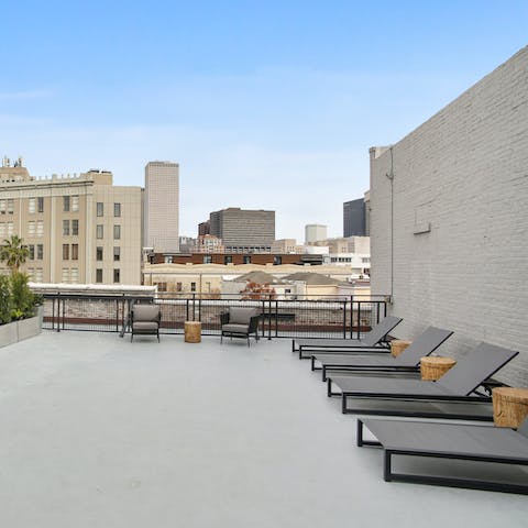 Look out over the city from the communal rooftop