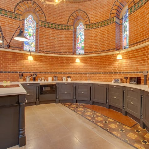 Cook up amazing meals in your unique kitchen, lit by stained glass windows