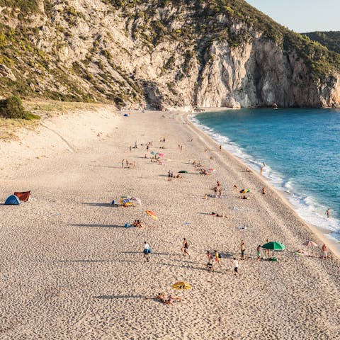 Spend the day on the pristine sands of Agios Ioannis, 800 metres away 