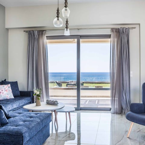 Slide open the glass doors and listen to the waves from the comfort of the sofa