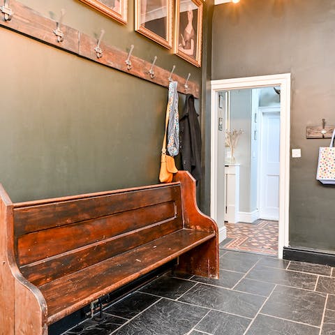 Contain the mess of muddy walks along one of the riverside footpaths in this home’s bespoke boot room 