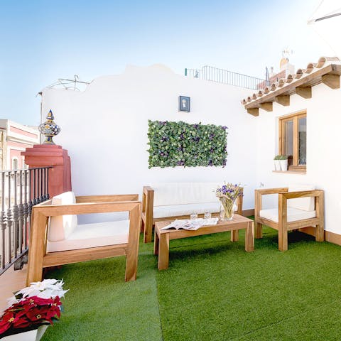 Relax on the rooftop terrace in the Seville sunshine