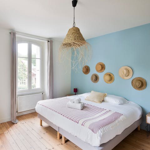 Enjoy leafy garden views from the relaxing bedrooms