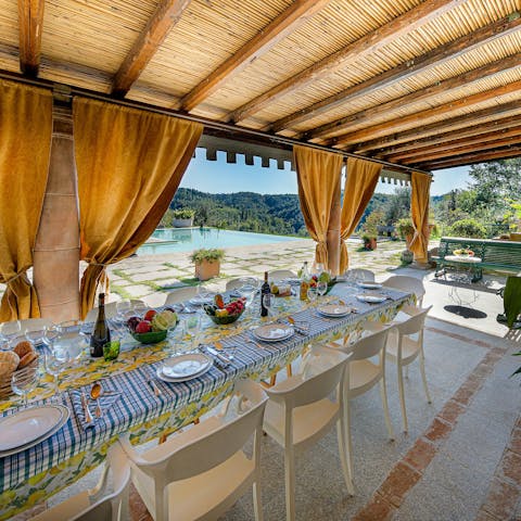 Gather for long lunches, Italian-style, beneath the curtained pergola