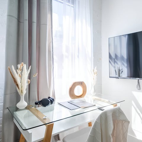Catch up on some work at the living room desk