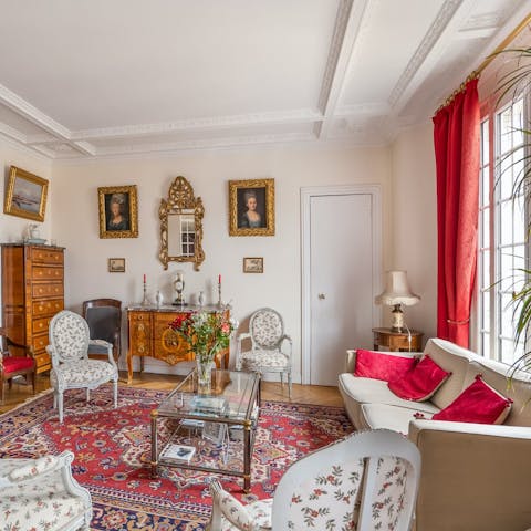 Sit back with a good glass of vintage in the elegant living room