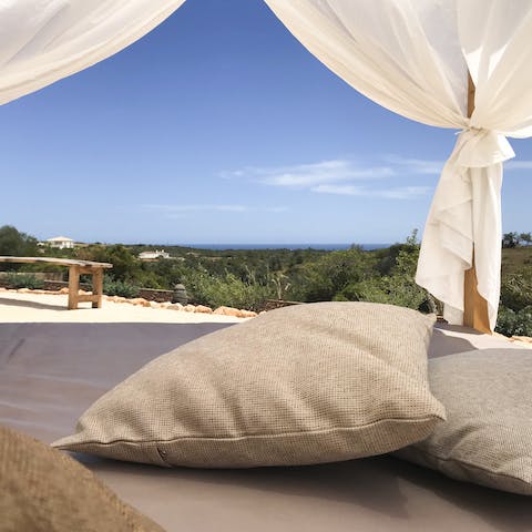 Lounge under the canopy and soak up the incredible views