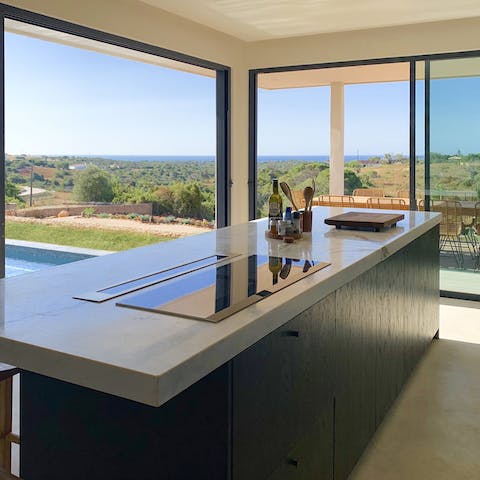 Cook up a storm in the sleek kitchen and dine alfresco as the sun goes down