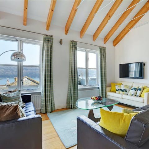 Take in estuary views from the characterful living room