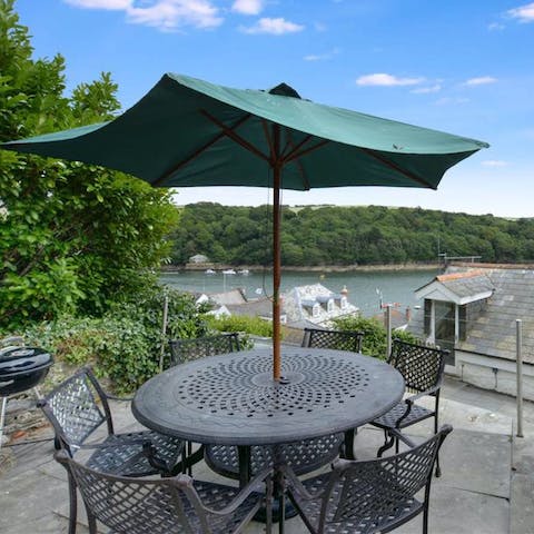 Sit out on the patio overlooking the water and enjoy a Cornish cream tea