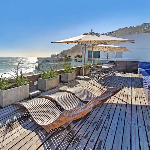 Lie back on loungers on your private roof terrace and listen to the sounds of the Atlantic Ocean